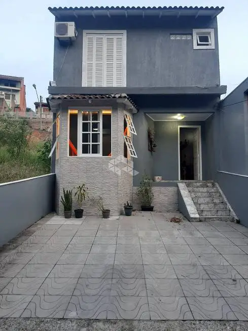 Foto 2 de Casa de Condomínio com 3 Quartos à venda, 114m² em Vila Nova, Porto Alegre
