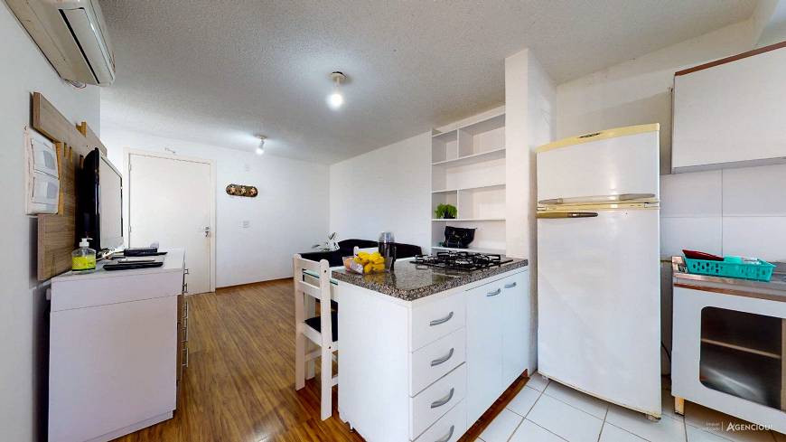 Foto 1 de Apartamento com 2 Quartos à venda, 48m² em Vila Nova, Porto Alegre