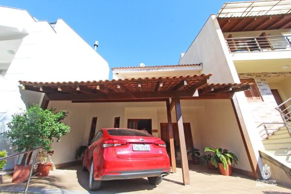 Foto 1 de Casa com 3 Quartos à venda, 189m² em Vila Nova, Porto Alegre