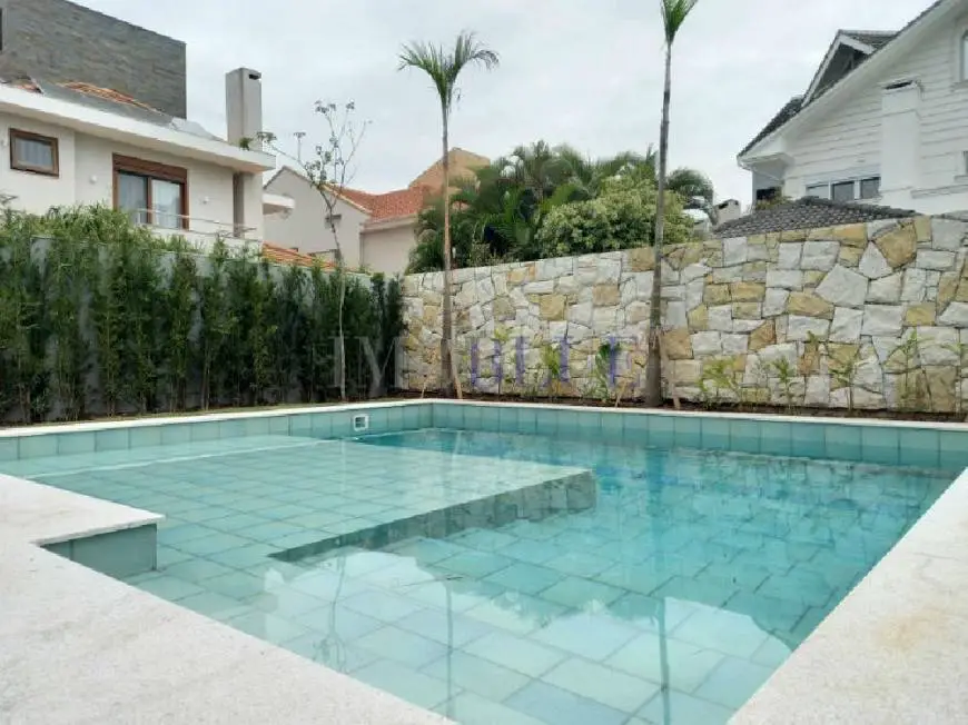 Foto 3 de Casa com 4 Quartos à venda, 449m² em Jurerê Internacional, Florianópolis
