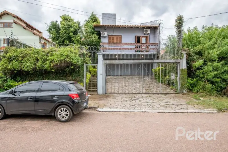 Foto 1 de Casa com 4 Quartos à venda, 390m² em Santa Tereza, Porto Alegre