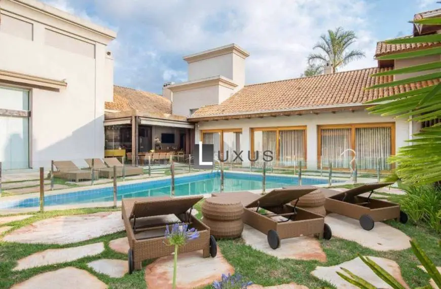 Foto 1 de Casa com 6 Quartos à venda, 2053m² em Vila Castela , Nova Lima