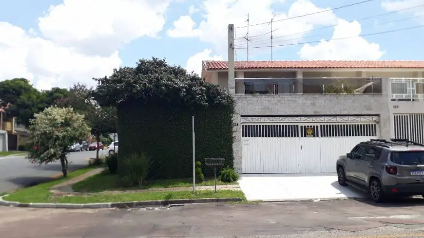 Foto 1 de Sobrado com 3 Quartos à venda, 165m² em Tarumã, Curitiba