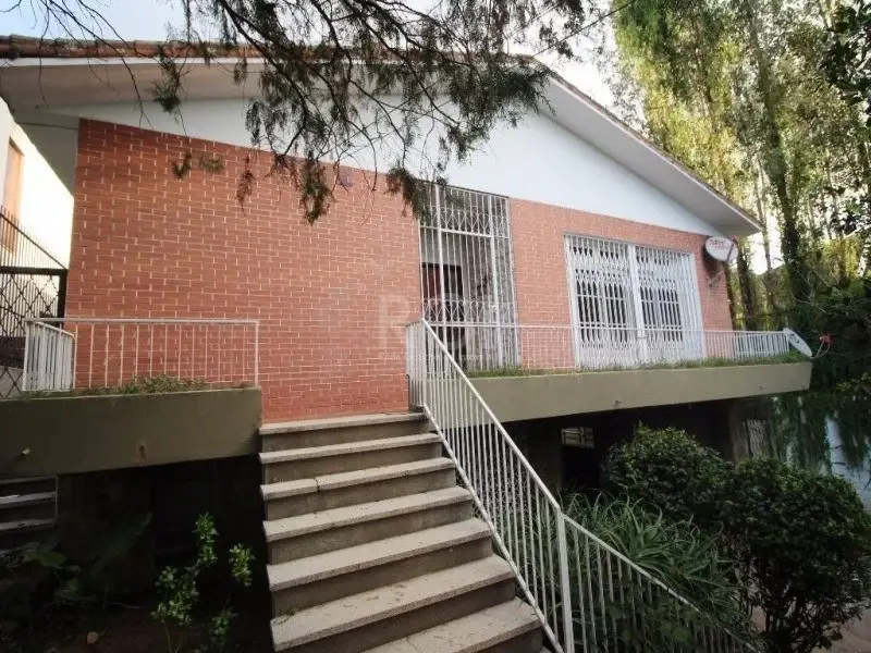 Foto 1 de Casa com 4 Quartos à venda, 304m² em Três Figueiras, Porto Alegre