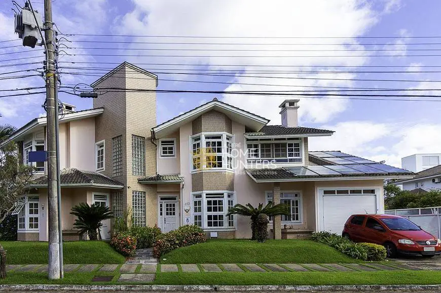 Foto 1 de Casa com 4 Quartos para venda ou aluguel, 350m² em Jurerê Internacional, Florianópolis