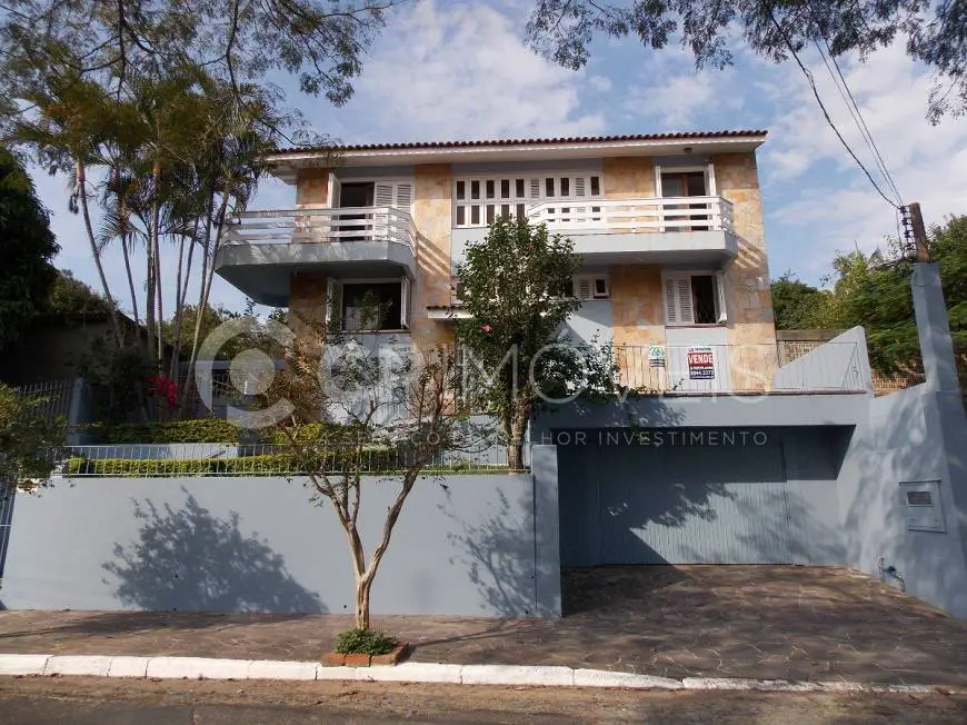 Foto 1 de Casa com 4 Quartos para alugar, 406m² em Jardim Itú Sabará, Porto Alegre