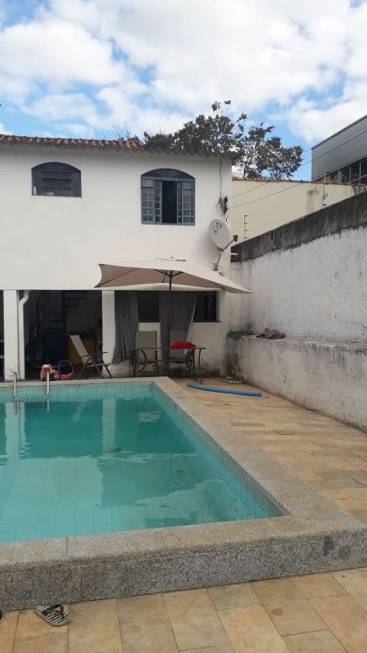 Foto 1 de Casa com 4 Quartos à venda, 100m² em Joana Darc, Lagoa Santa