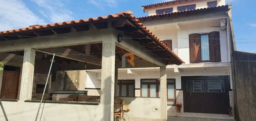 Foto 5 de Casa com 3 Quartos à venda, 270m² em Guajuviras, Canoas
