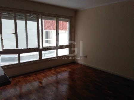 Foto 2 de Apartamento com 2 Quartos à venda, 76m² em Auxiliadora, Porto Alegre