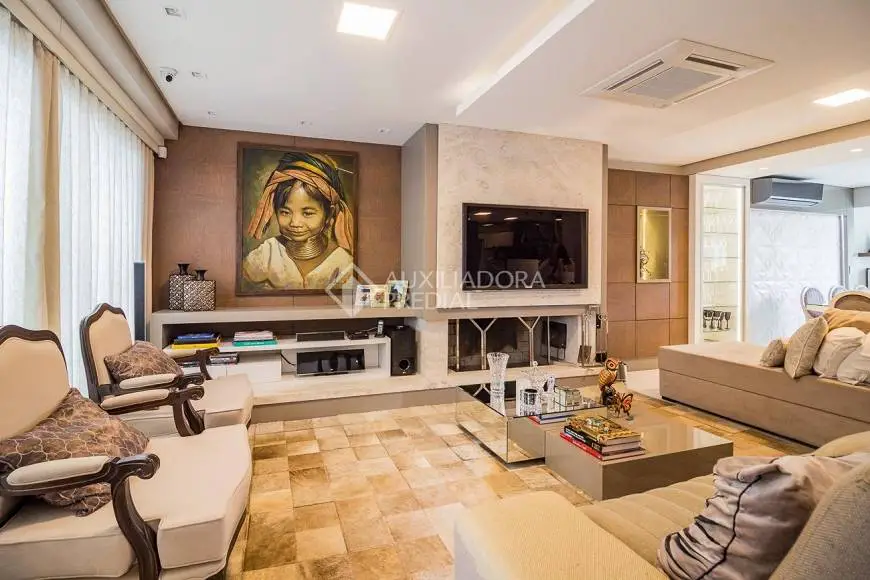Foto 1 de Casa de Condomínio com 4 Quartos à venda, 324m² em Três Figueiras, Porto Alegre