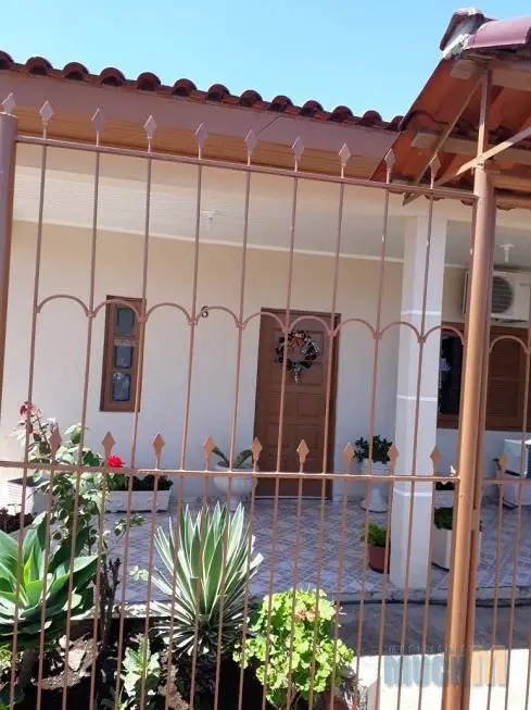 Foto 1 de Casa com 3 Quartos à venda, 200m² em Guajuviras, Canoas