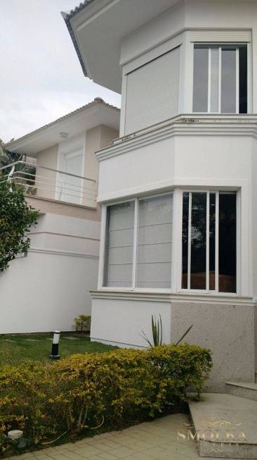 Foto 3 de Casa com 4 Quartos à venda, 316m² em Jurerê Internacional, Florianópolis