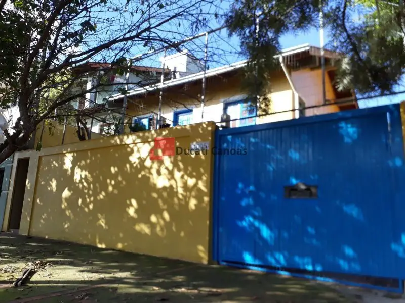 Foto 1 de Casa com 4 Quartos para alugar, 109m² em Estância Velha, Canoas