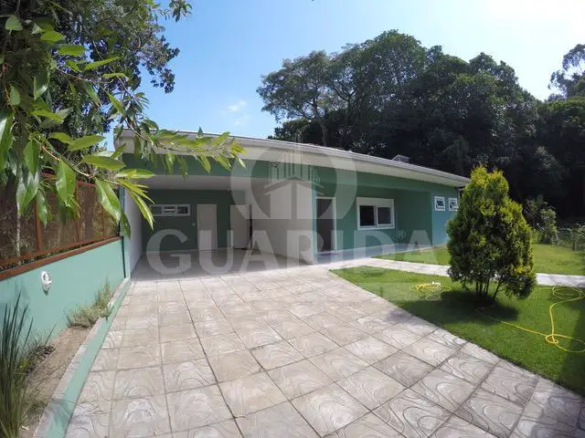 Foto 1 de Casa com 4 Quartos à venda, 213m² em Vila Nova, Porto Alegre
