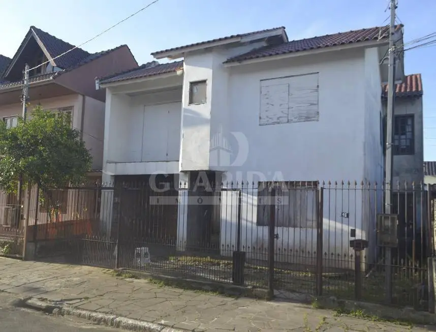 Foto 1 de Sobrado com 4 Quartos à venda, 200m² em São Sebastião, Porto Alegre