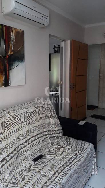 Foto 5 de Apartamento com 3 Quartos à venda, 69m² em Vila Nova, Porto Alegre