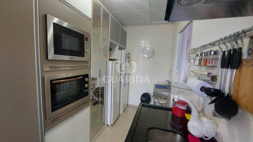 Foto 3 de Apartamento com 3 Quartos à venda, 78m² em Vila Nova, Porto Alegre