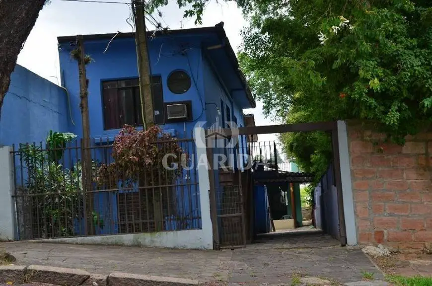 Foto 1 de Casa com 5 Quartos à venda, 231m² em Partenon, Porto Alegre