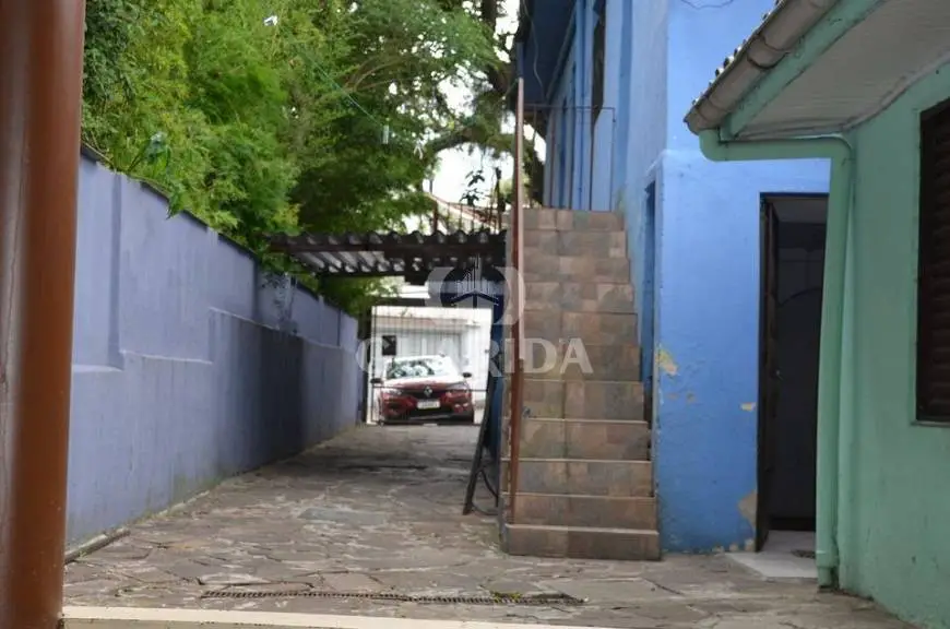 Foto 2 de Casa com 5 Quartos à venda, 231m² em Partenon, Porto Alegre