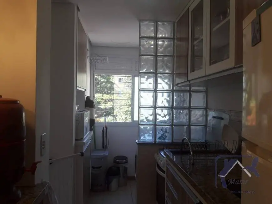 Foto 4 de Apartamento com 2 Quartos à venda, 55m² em Guarujá, Porto Alegre