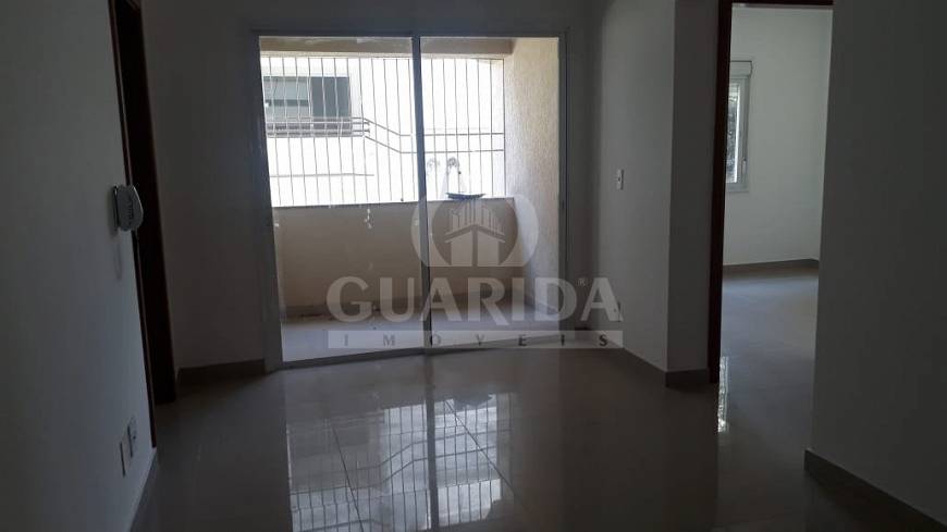 Foto 2 de Apartamento com 2 Quartos à venda, 57m² em Vila Nova, Porto Alegre