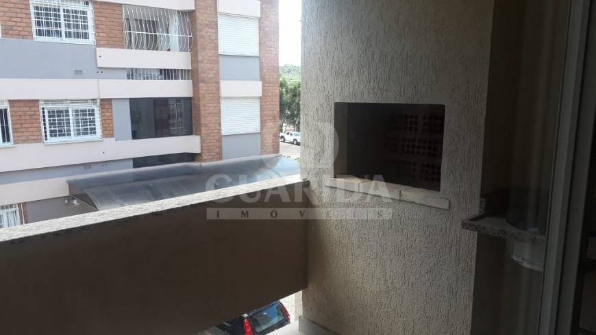 Foto 5 de Apartamento com 2 Quartos à venda, 57m² em Vila Nova, Porto Alegre