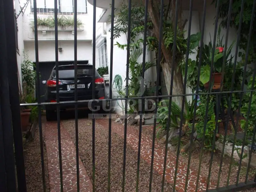 Foto 1 de Casa com 3 Quartos à venda, 125m² em Auxiliadora, Porto Alegre