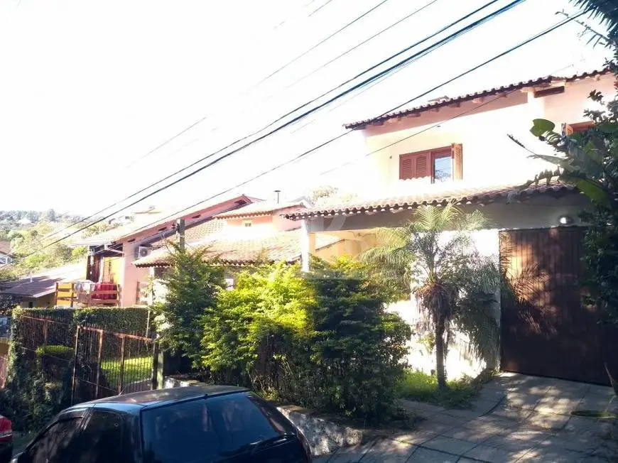 Foto 1 de Casa de Condomínio com 3 Quartos à venda, 135m² em Vila Nova, Porto Alegre