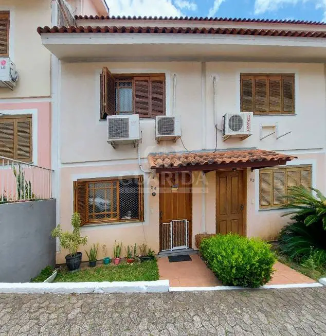Foto 1 de Casa de Condomínio com 3 Quartos à venda, 116m² em Espiríto Santo, Porto Alegre