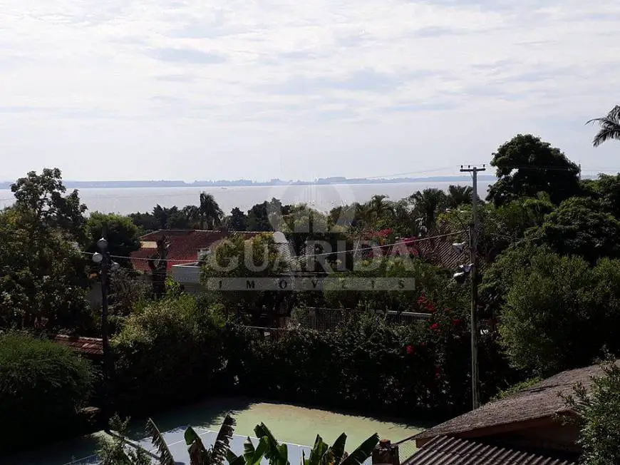 Foto 1 de Casa de Condomínio com 4 Quartos à venda, 151m² em Tristeza, Porto Alegre