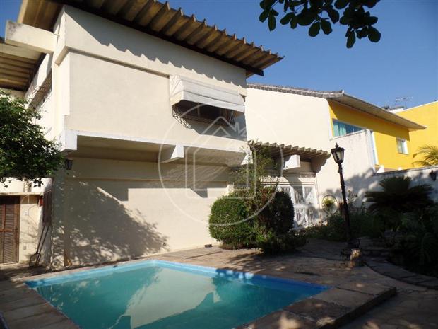Foto 1 de Casa com 8 Quartos à venda, 402m² em Jardim Guanabara, Rio de Janeiro