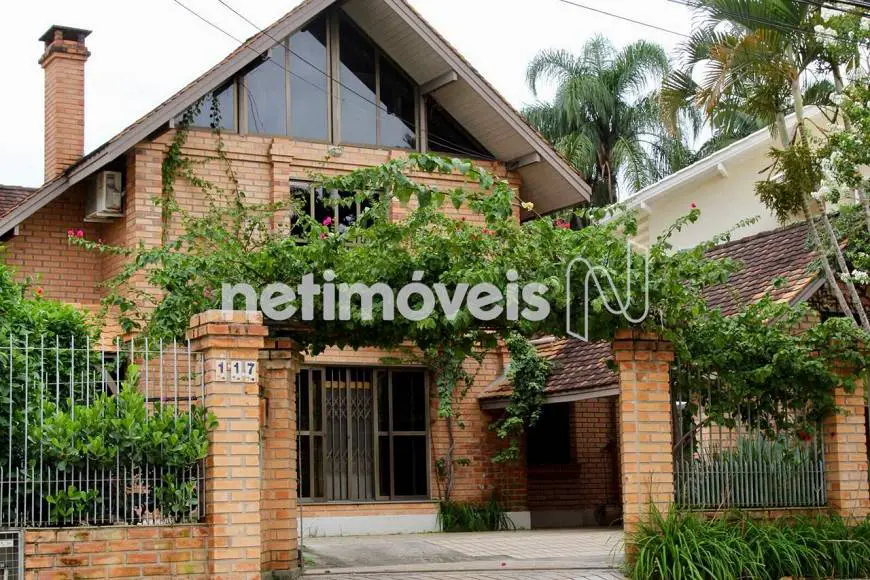 Foto 1 de Casa com 5 Quartos à venda, 360m² em Itacorubi, Florianópolis