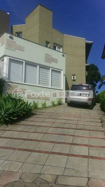 Foto 1 de Casa de Condomínio com 2 Quartos à venda, 184m² em Vila Nova, Porto Alegre