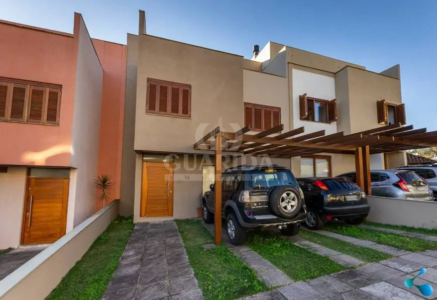 Foto 1 de Casa de Condomínio com 4 Quartos à venda, 164m² em Vila Nova, Porto Alegre