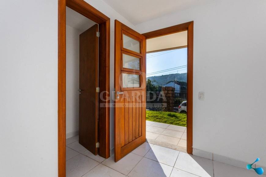 Foto 4 de Casa de Condomínio com 4 Quartos à venda, 164m² em Vila Nova, Porto Alegre