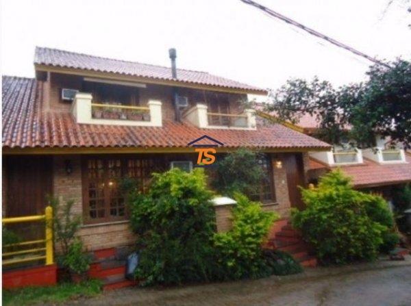 Foto 1 de Casa com 2 Quartos à venda, 95m² em Cavalhada, Porto Alegre