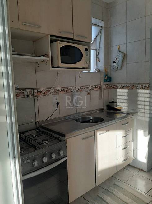 Foto 3 de Apartamento com 3 Quartos à venda, 113m² em Santo Antônio, Porto Alegre