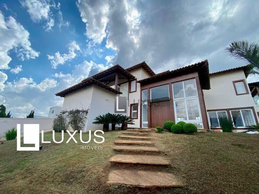 Foto 1 de Casa de Condomínio com 4 Quartos à venda, 400m² em Vila Castela , Nova Lima