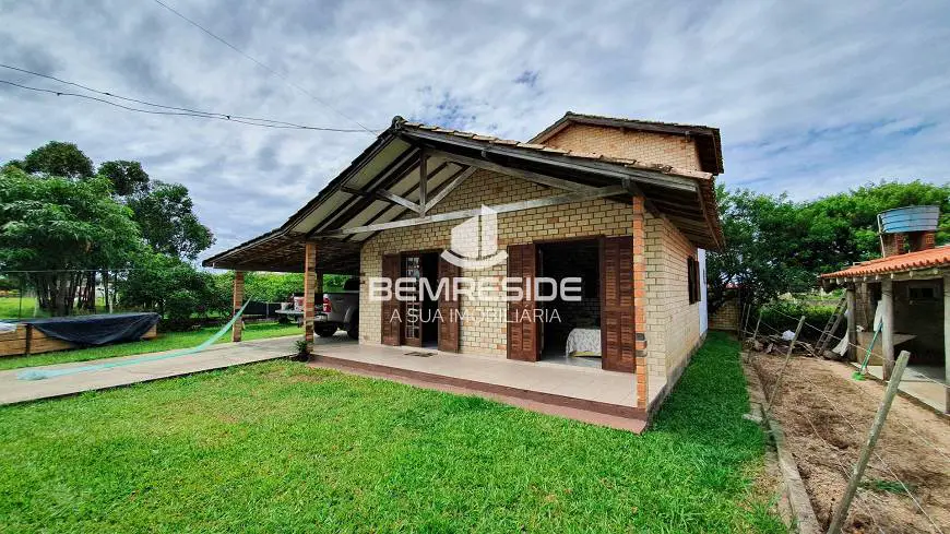 Foto 1 de Casa com 4 Quartos à venda, 140m² em , Jaguaruna