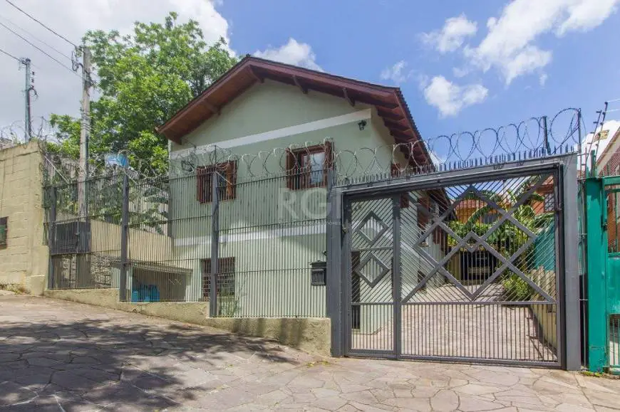 Foto 2 de Casa com 5 Quartos à venda, 380m² em Glória, Porto Alegre