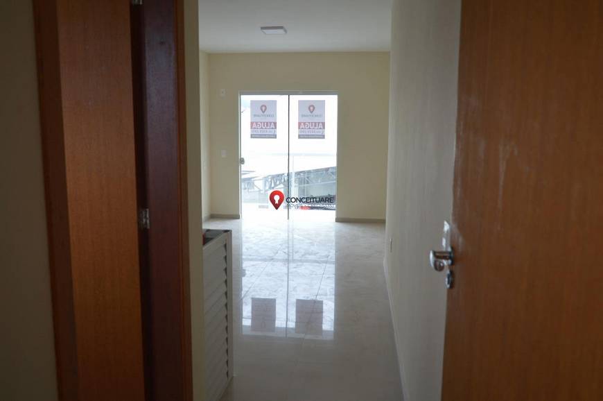 Foto 1 de Apartamento com 2 Quartos para alugar, 65m² em Carianos, Florianópolis