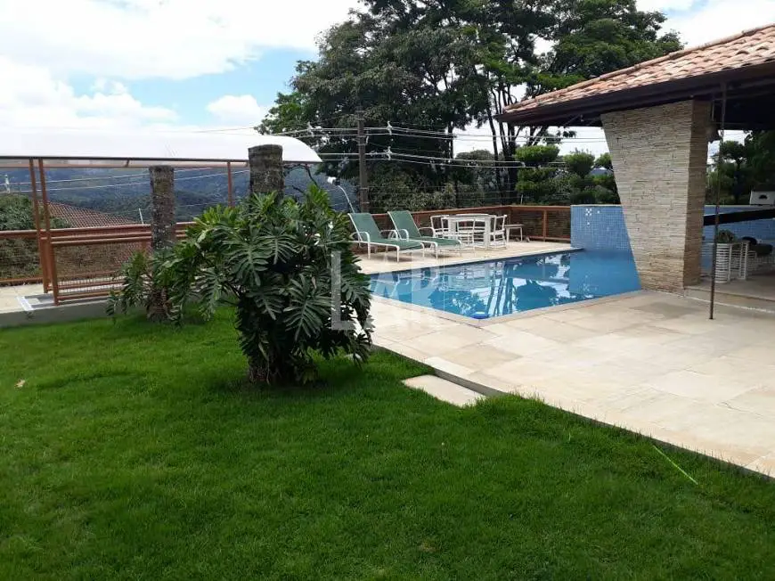 Foto 1 de Casa de Condomínio com 4 Quartos à venda, 557m² em Residencial Sul, Nova Lima