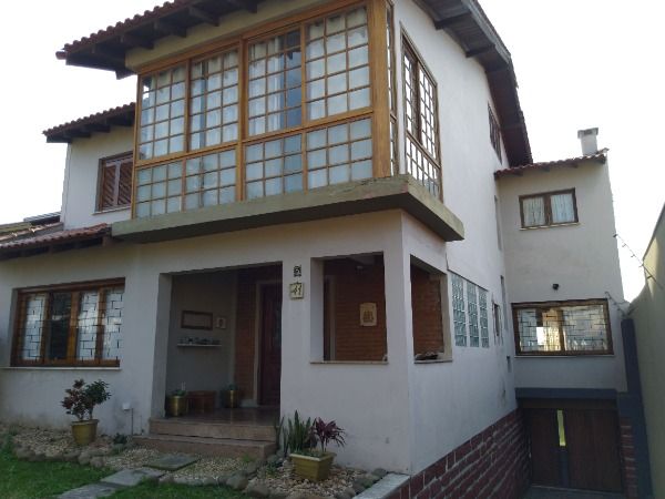 Foto 1 de Casa com 3 Quartos à venda, 409m² em Espiríto Santo, Porto Alegre