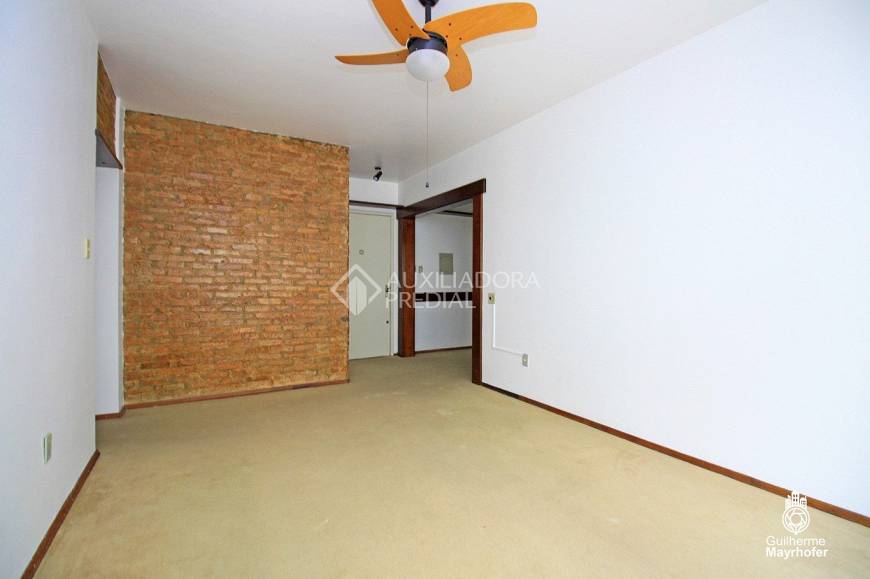 Foto 1 de Apartamento com 2 Quartos à venda, 77m² em Auxiliadora, Porto Alegre