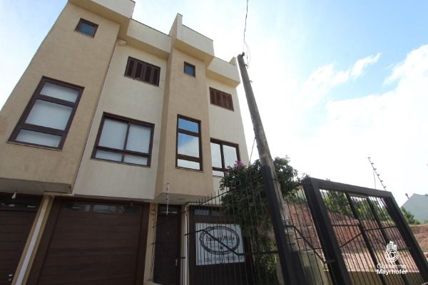 Foto 2 de Casa com 3 Quartos à venda, 180m² em Hípica, Porto Alegre