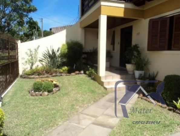 Foto 2 de Casa com 4 Quartos à venda, 318m² em Cavalhada, Porto Alegre