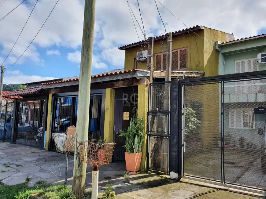 Foto 3 de Sobrado com 5 Quartos à venda, 160m² em Aberta dos Morros, Porto Alegre