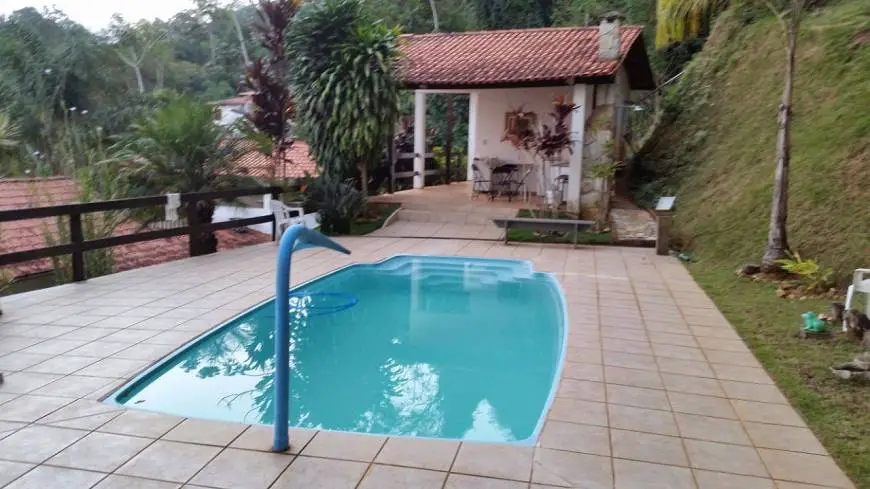 Foto 1 de Casa de Condomínio com 4 Quartos à venda, 385m² em Zona Rural, Rio Acima