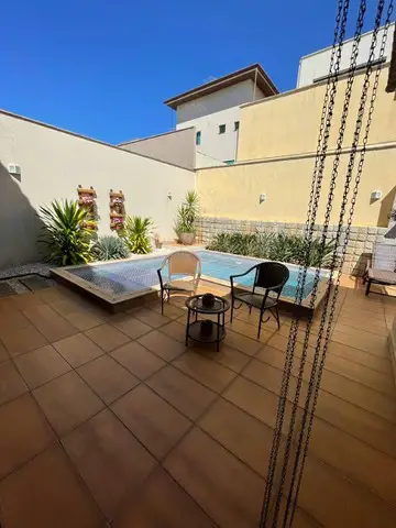 Foto 3 de Casa de Condomínio com 5 Quartos à venda, 409m² em Jardins Madri, Goiânia