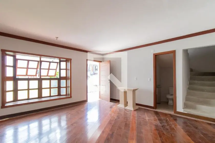 Foto 2 de Casa de Condomínio com 3 Quartos à venda, 150m² em Santo Antônio, Porto Alegre